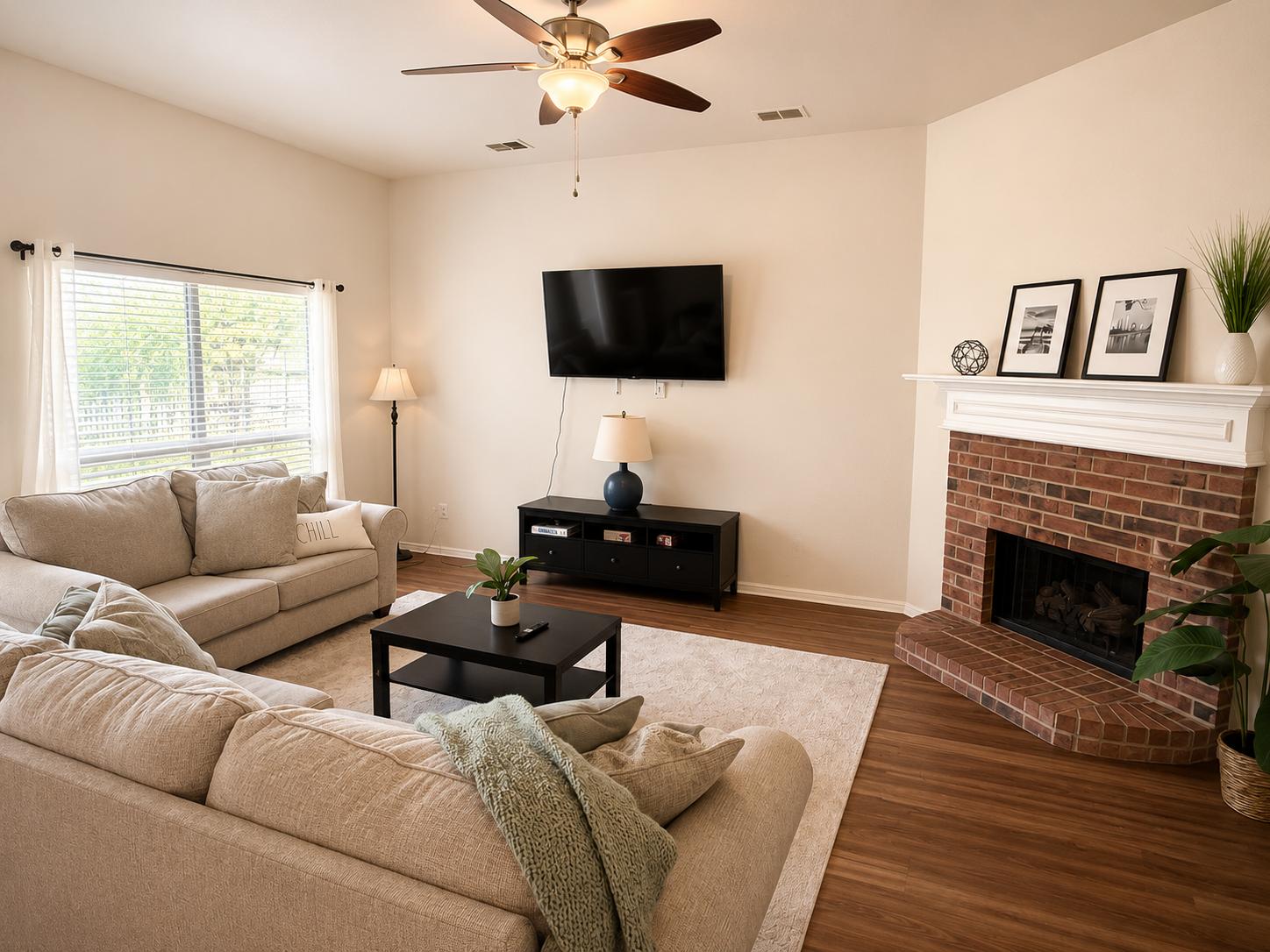 Bright comfortable living room with fireplace
